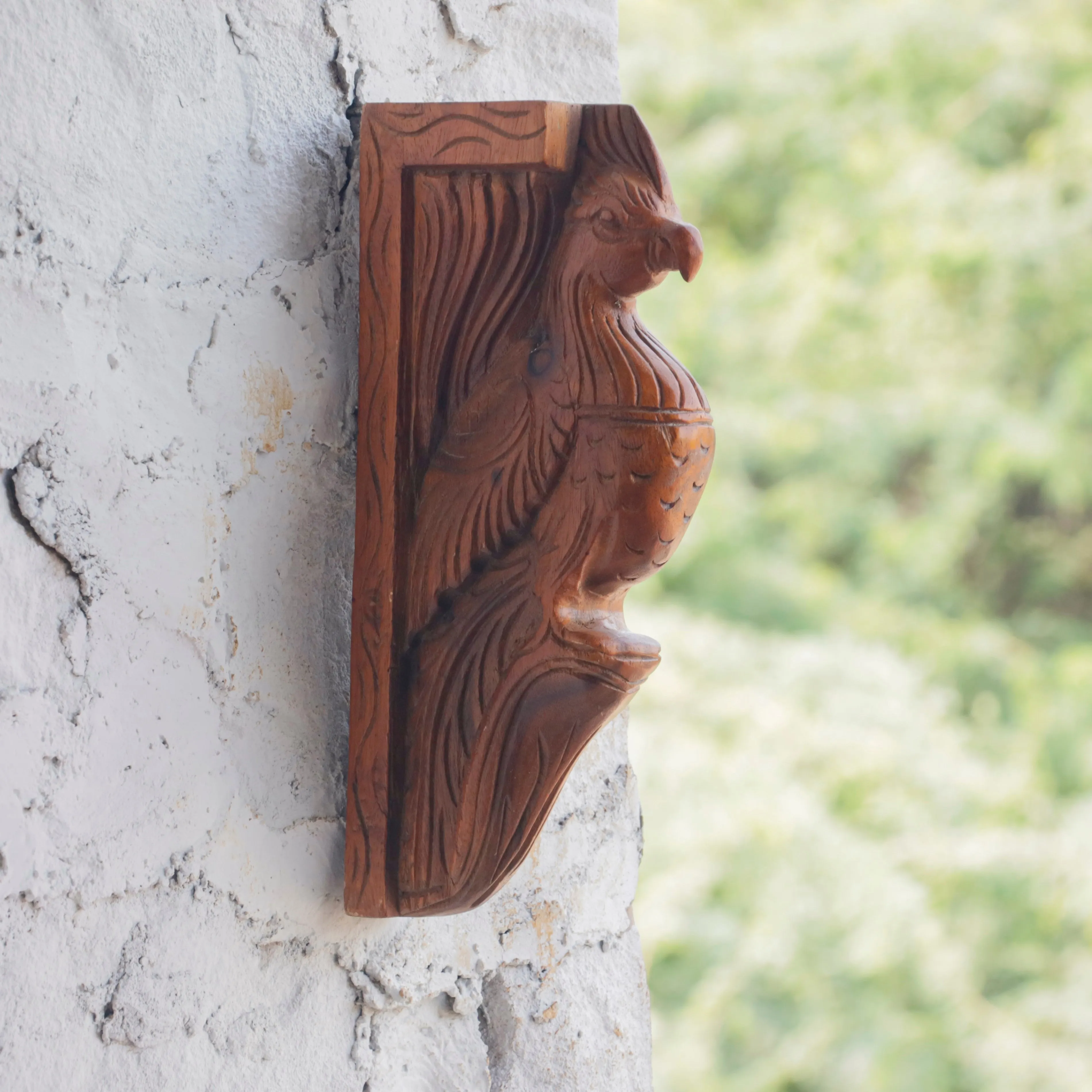 Compact intricate carved Bird Door Bracket